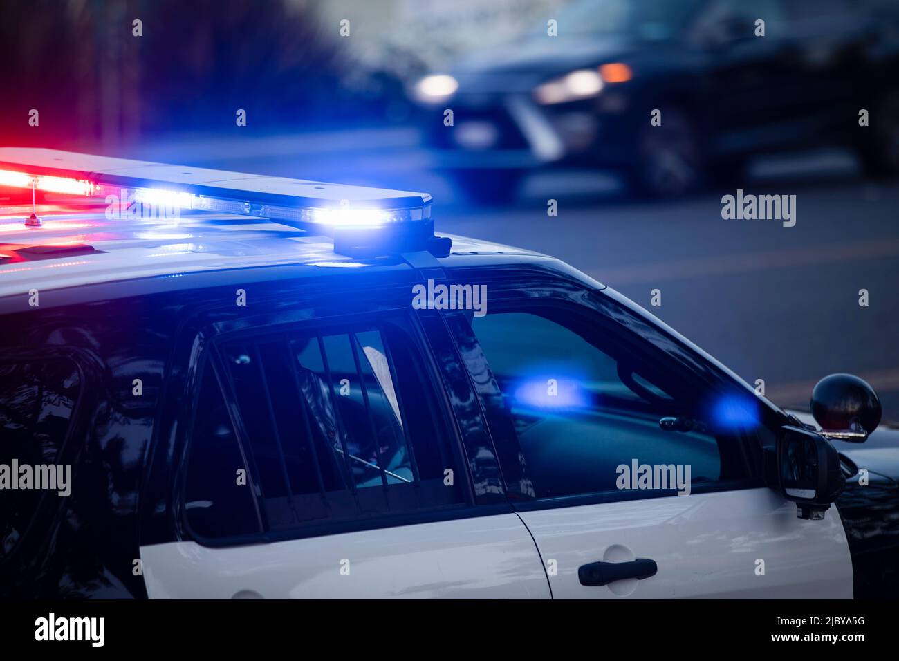 A police unit responds to the scene of an emergency. Stock Photo