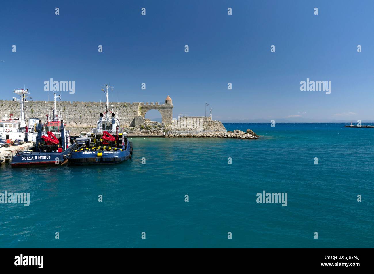 Tug boats at Colona Harbour, Rhodes Town, Rhodes Island, Greece, Dodecanese Stock Photo
