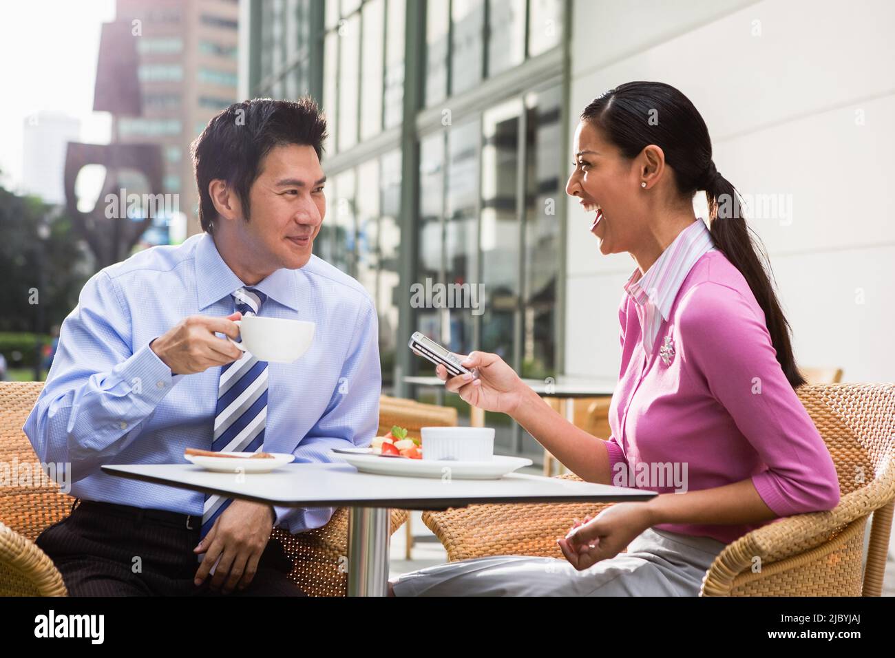 Couple having breakfast together in cafe Stock Photo