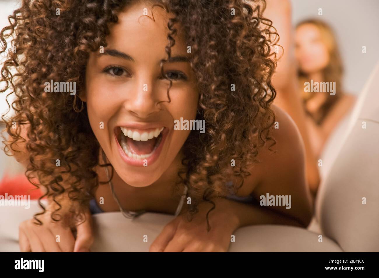 Mixed race woman laughing Stock Photo