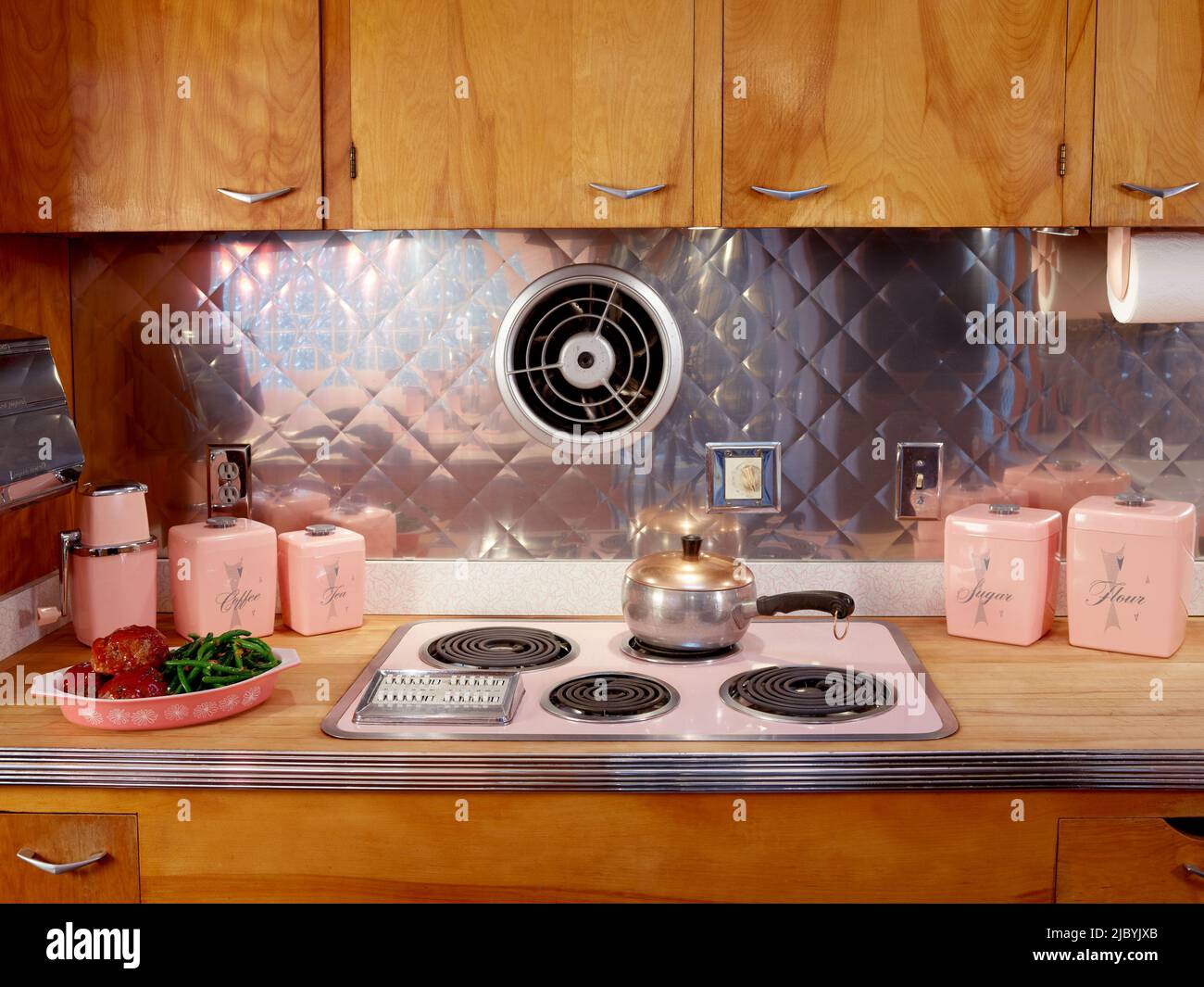 Vintage kitchen with a pink stove and wood countertop. Dallas, Texas