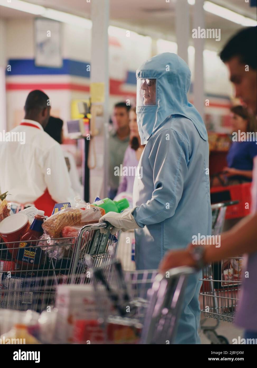 Man wearing a hazmat suit, to protect himself from hazardous materials