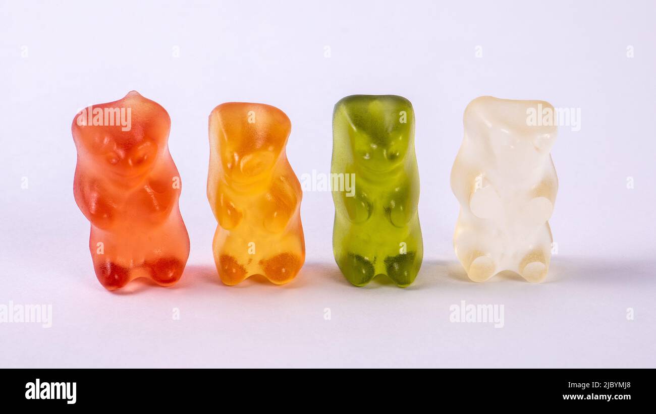 Set of colored rubber bears on a white background. Sweets and unhealthy eating. Stock Photo