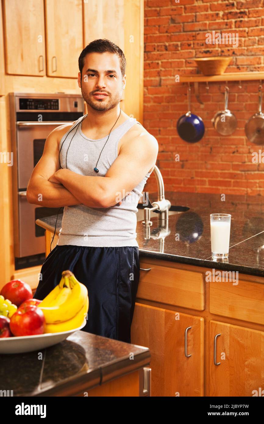 Hispanic man drinking milk after exercise Stock Photo Alamy