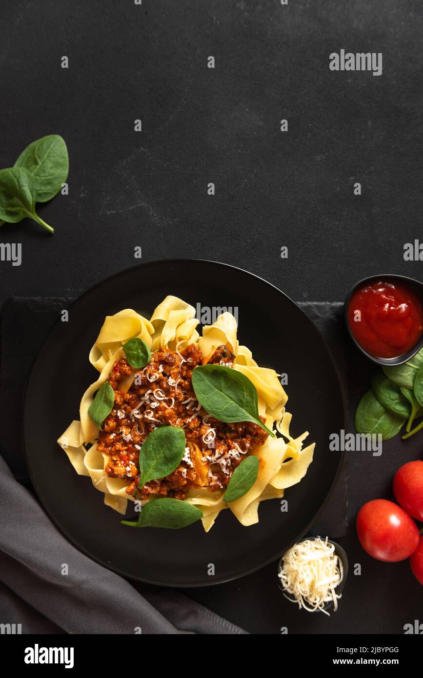 spaghetti on a gray background. Classic Italian Food Stock Photo