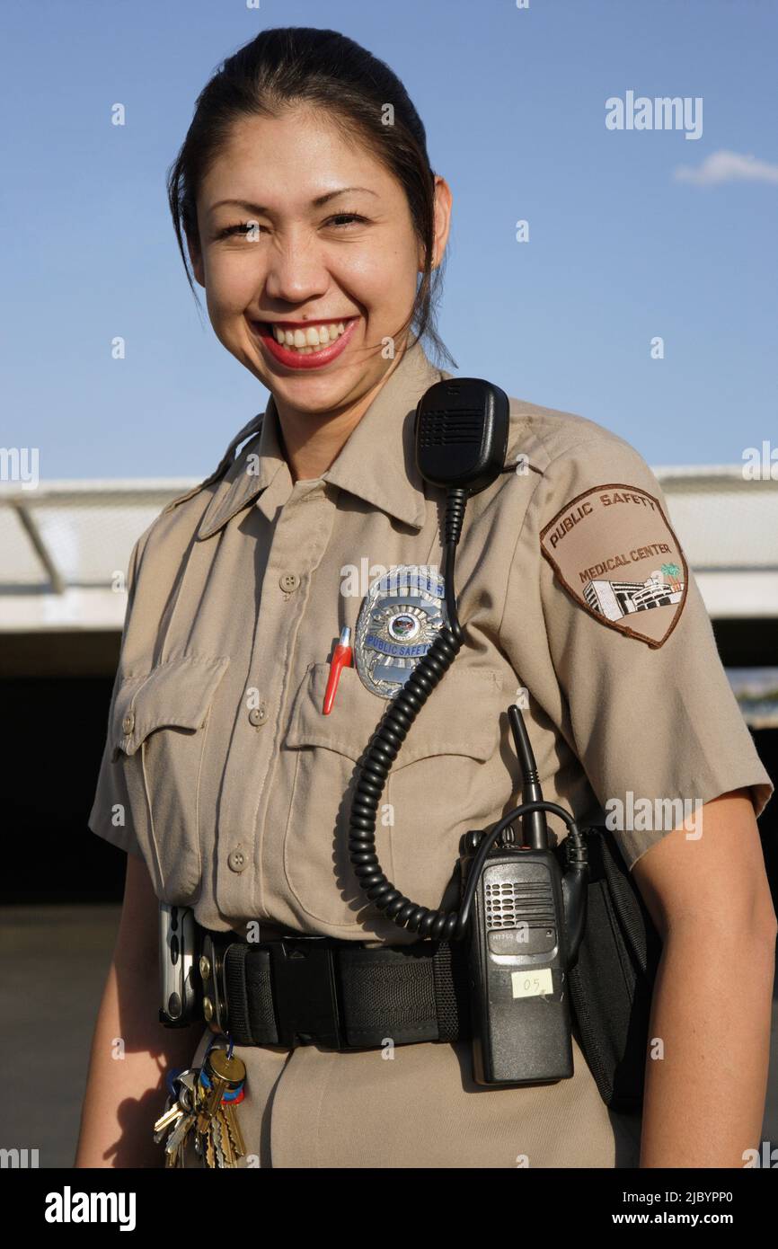 Female Hispanic security guard Stock Photo Alamy