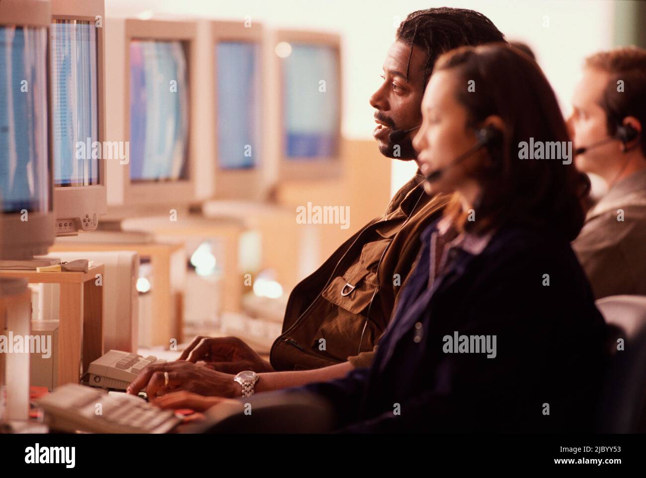 Multi-ethnic businesspeople working in call center Stock Photo