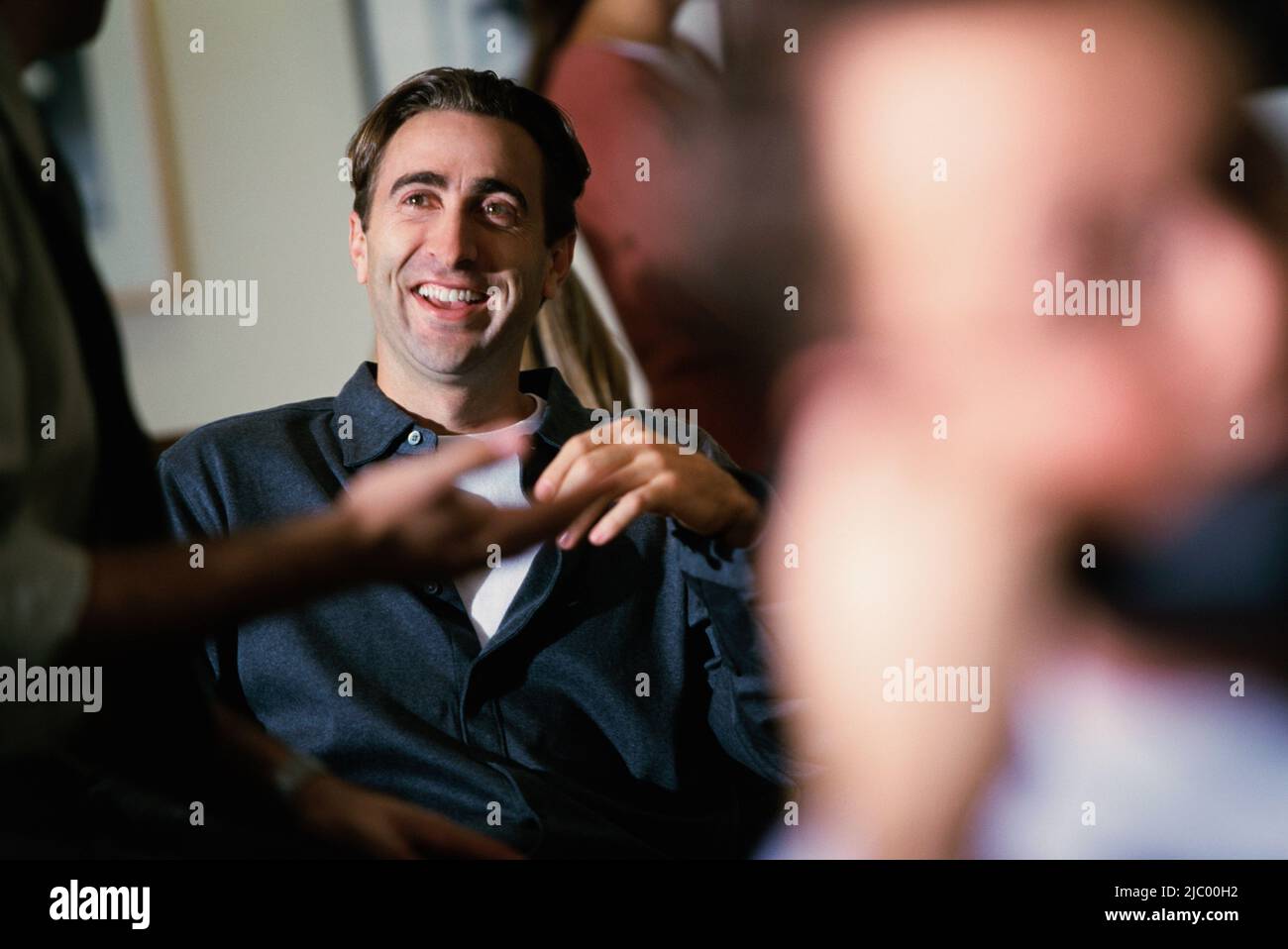 Co-workers talking Stock Photo