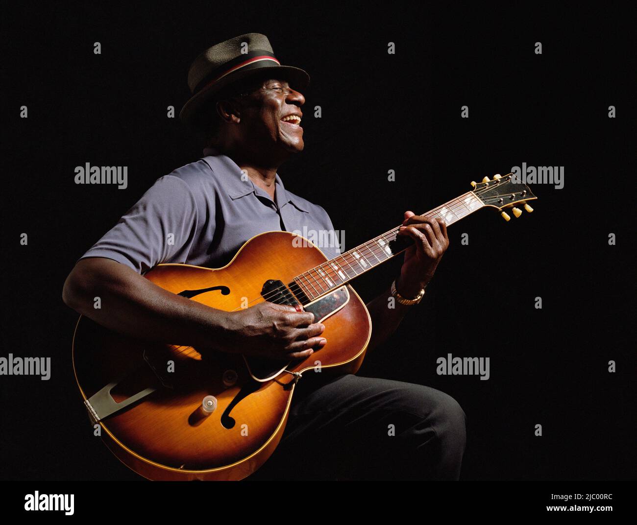 African American man playing guitar Stock Photo - Alamy