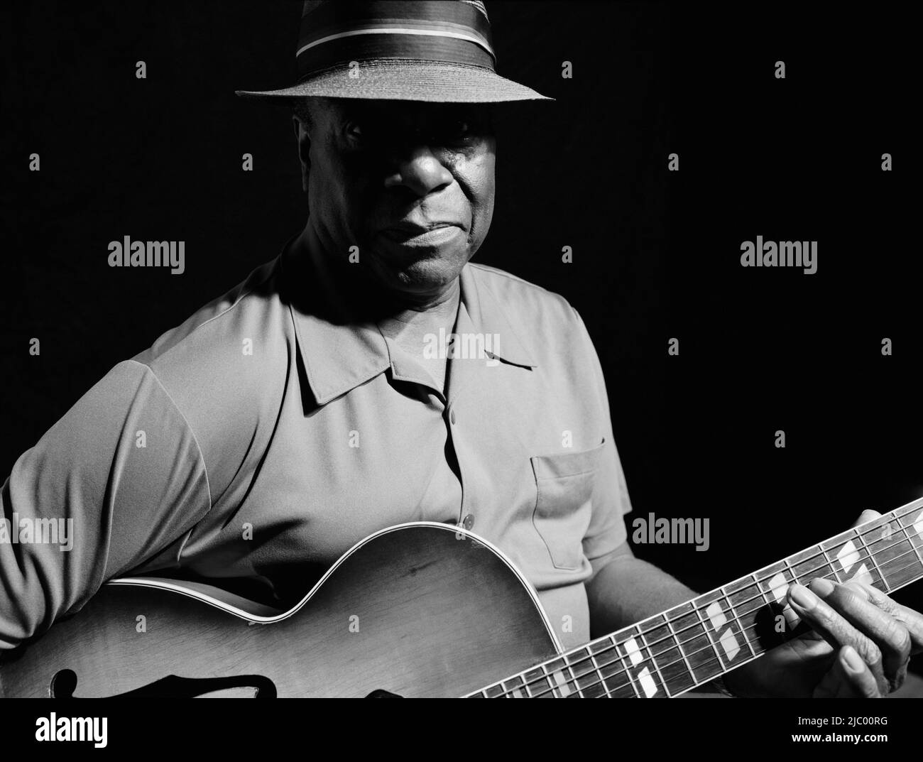 African American man playing guitar Stock Photo - Alamy