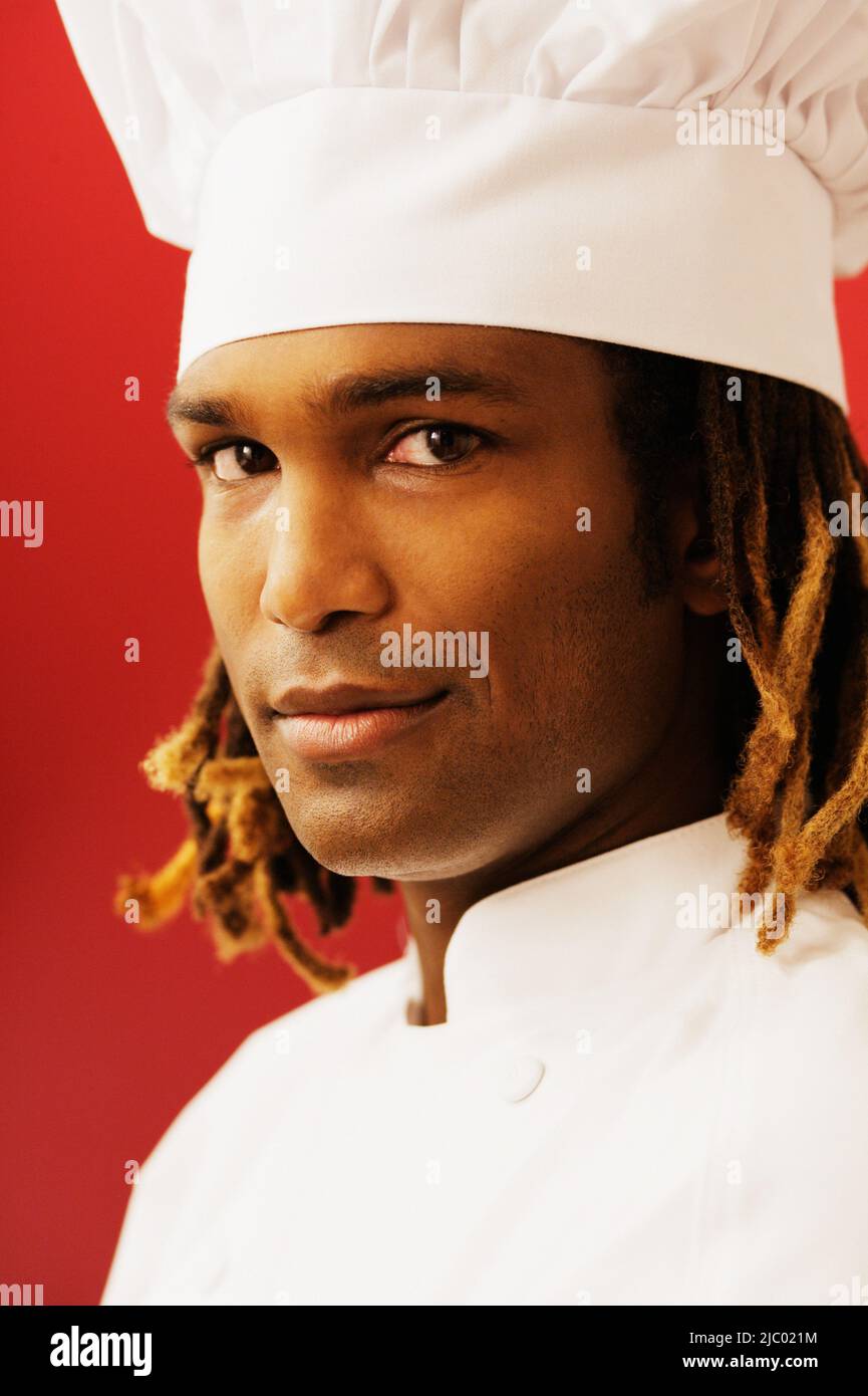 Portrait of male chef wearing hat Stock Photo