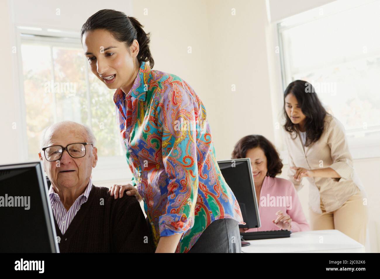 Elderly people taking a computers class Stock Photo Alamy