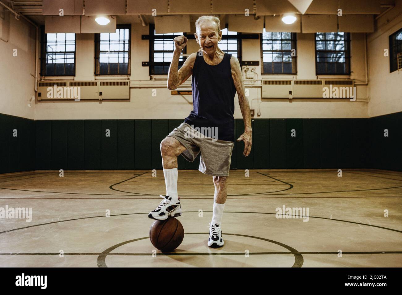 Elderly man playing basketball Stock Photo - Alamy