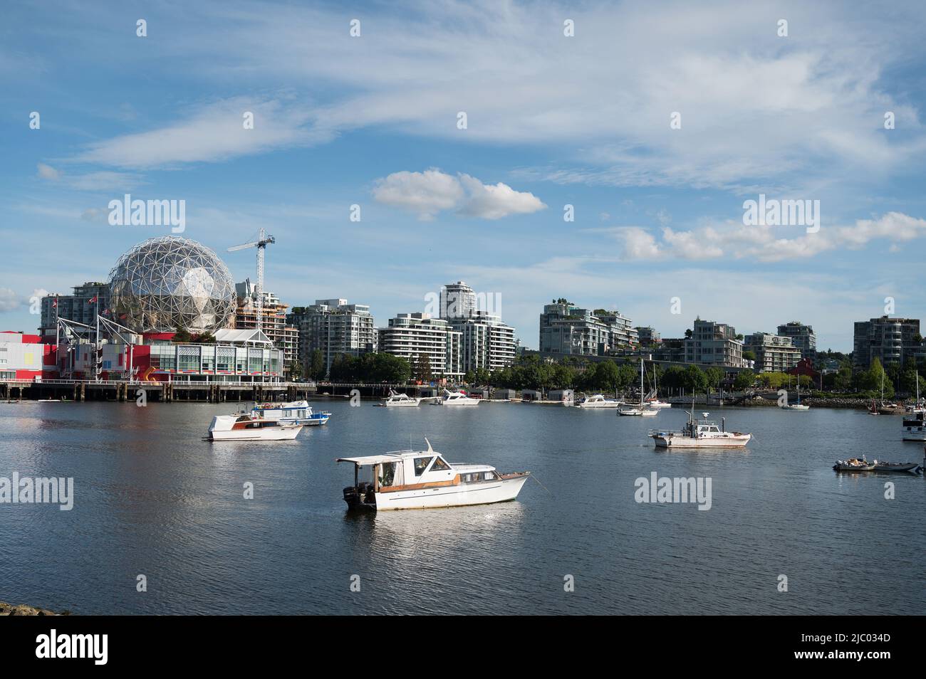 Live about yachts and boats moored in VancouverÕs False Creek in the Yaletown neighbourhood.  Vancouver BC, Canada. Stock Photo