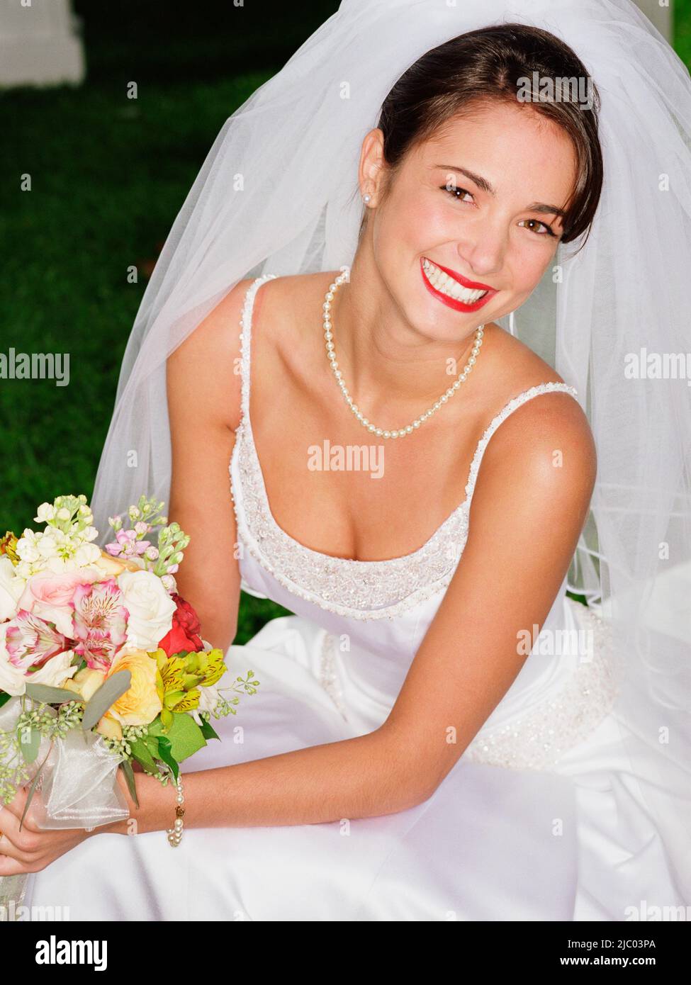 Bride posing for the camera Stock Photo