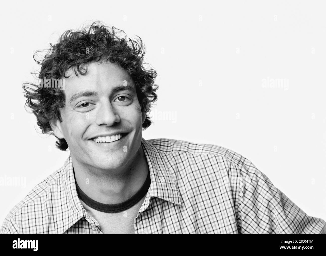 Young man smiling Stock Photo