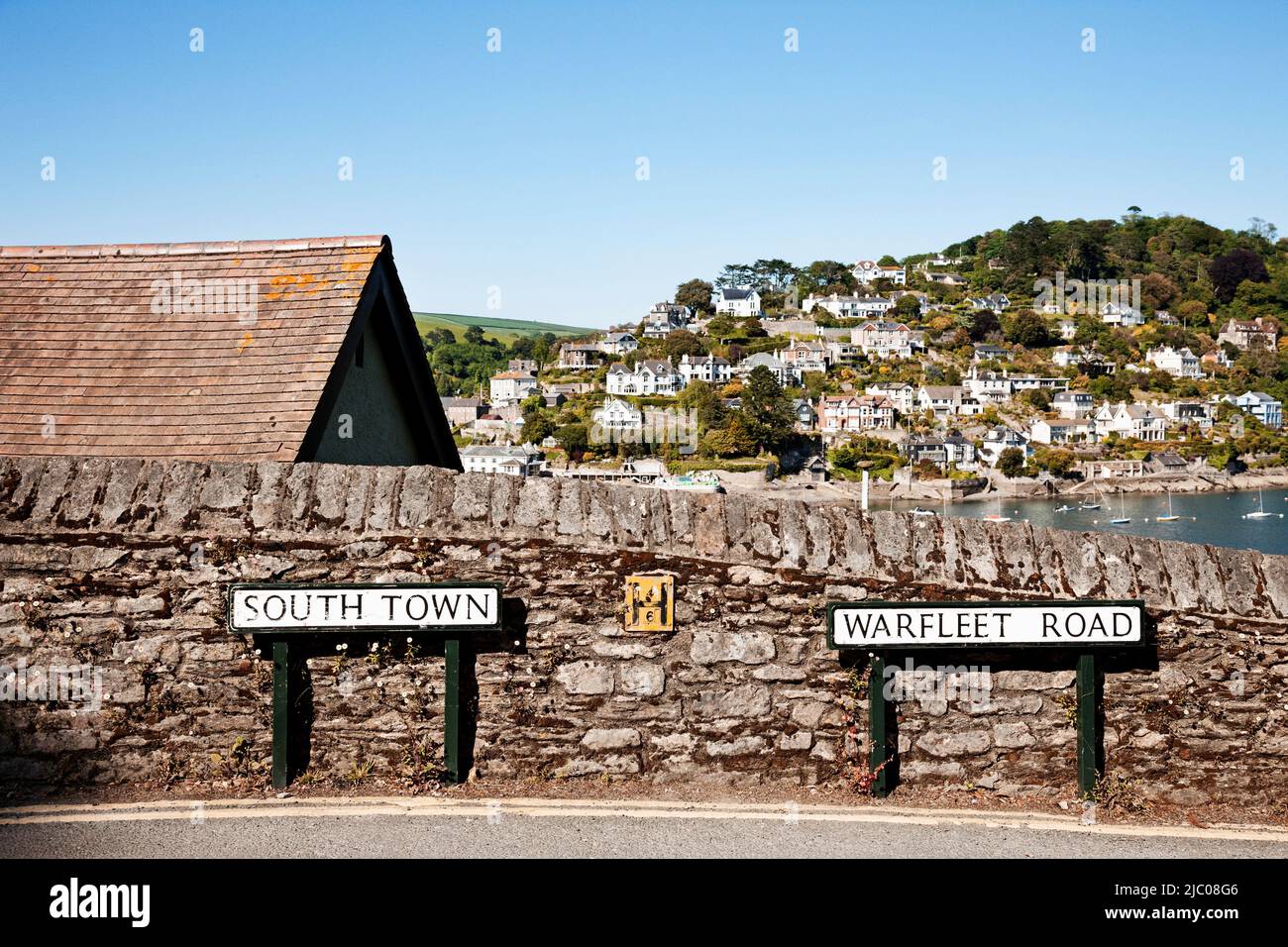 Bridge over the River Dart with signs posted for South Town and