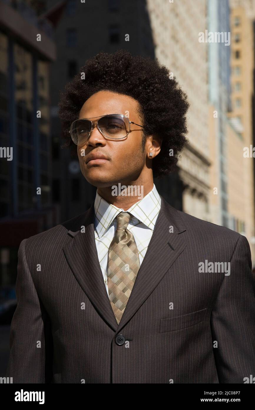 Business businessman standing city street hi-res stock photography and ...