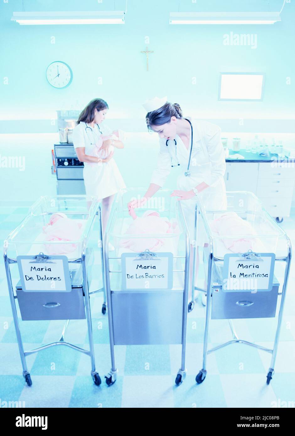 Nurses taking care of babies at the hospital maternity ward Stock Photo