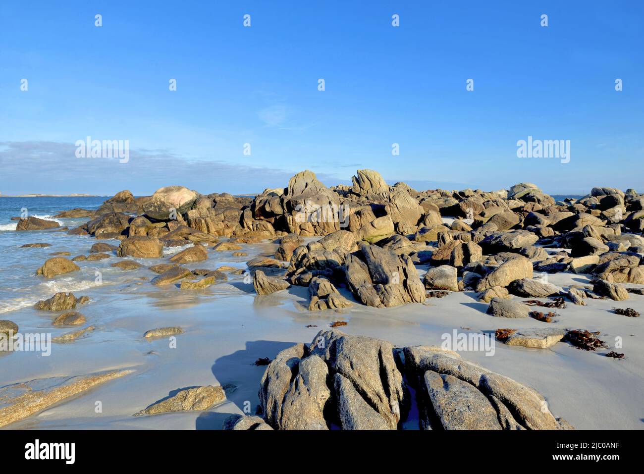 beach  in iroise sea with rocks in the sea under blue sky in Brittany - France Stock Photo