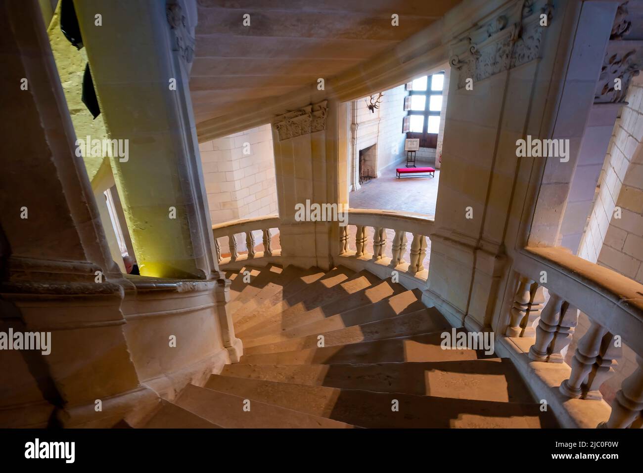 The double-spiral staircase inside Château de Chambord in Chambord, Centre-Val de Loire, France. It was built to serve as a hunting lodge for Francis Stock Photo
