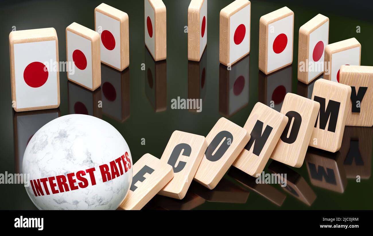 Japan and interest rates, economy and domino effect - chain reaction in Japan set off by interest rates causing a crash - economy blocks and Japan fla Stock Photo