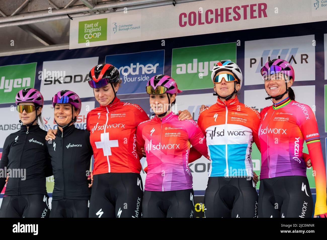 Cyclists of team SD Worx at Colchester Sports Park sign in before