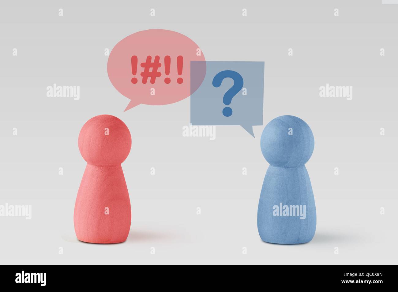 Pink and blue Pawns with round and sqaure speech bubbles - Concept of dialogue between man and woman and different thinking Stock Photo