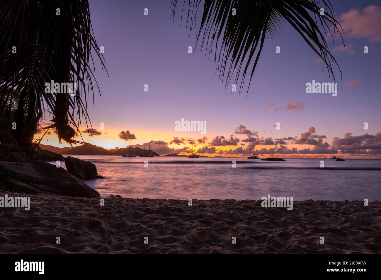 Anse Patates beach, La Digue Island, Seychelles, white beach with blue