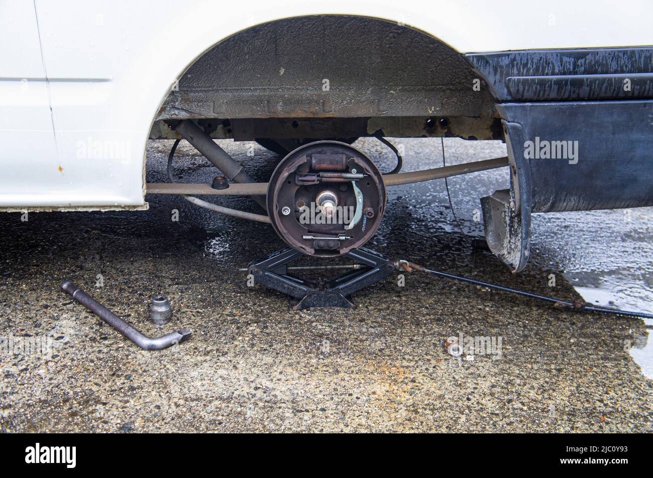 Illustrative photo, Ford Transit,rusty rear car wheel hub with drum