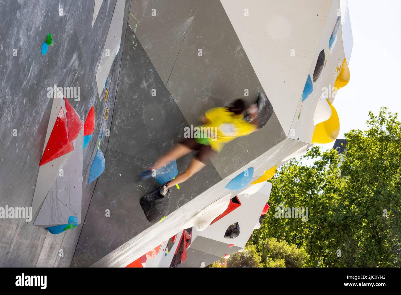Climbing. Sport. Young person climbing in Block Climbing. Olympic