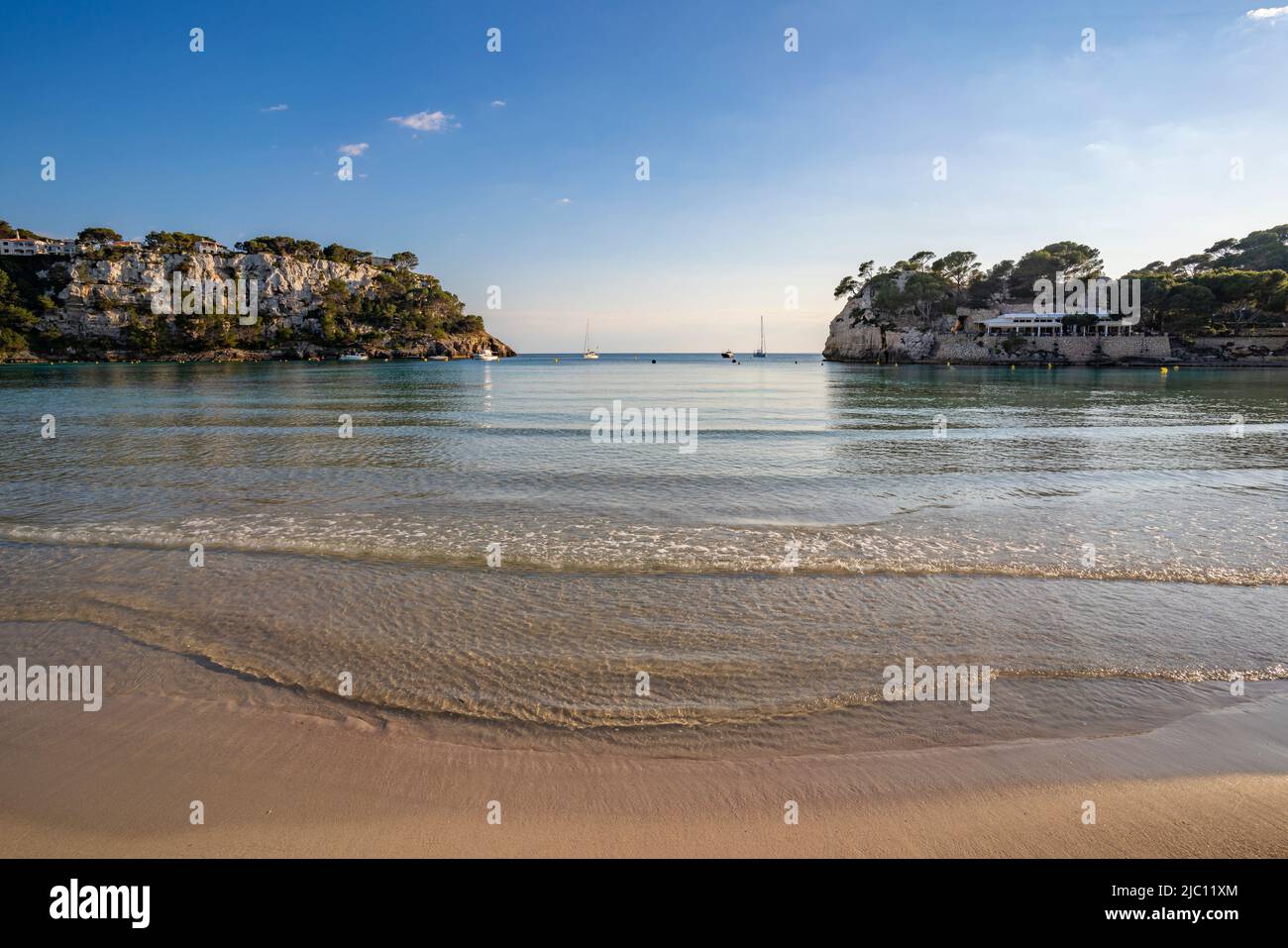 View of houses overlooking Platja de Cala Galdana in Cala Galdana, Cala