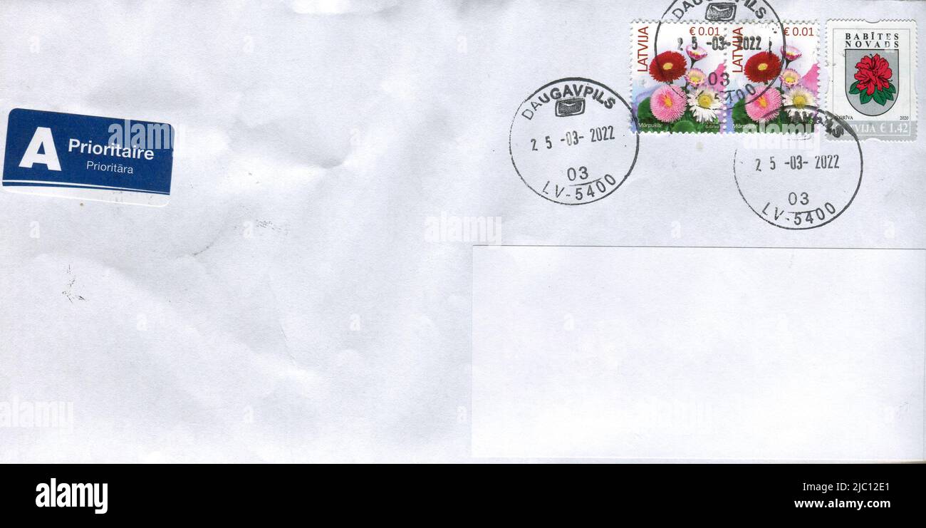 Old envelope which was dispatched from Latvia to Gomel, Belarus, circa 2022. Stock Photo