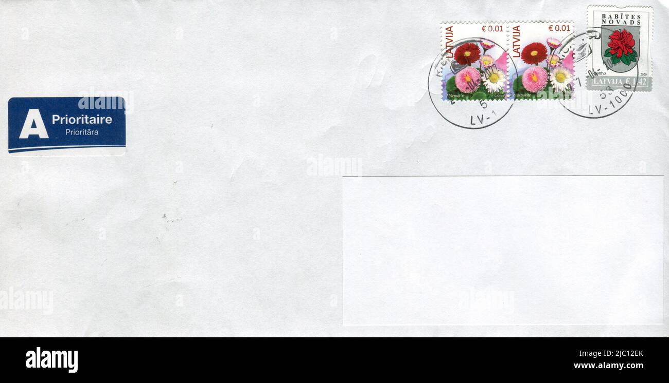 Old envelope which was dispatched from Latvia to Gomel, Belarus, circa 2022. Stock Photo