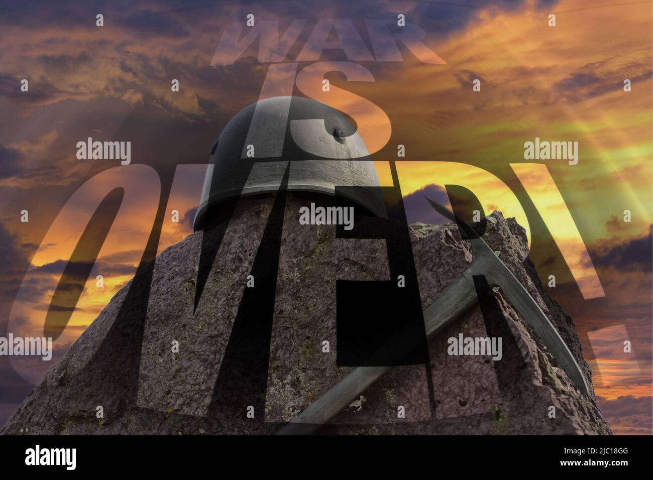 War is over writing black on helmet fire background Stock Photo