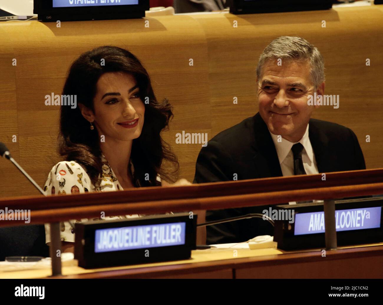 File - US actor George Clooney (R) and wife Amal Clooney attend a Leaders Summit for Refugees during the United Nations 71st session of the General Debate at the United Nations General Assembly at United Nations headquarters in New York City, NY, USA, September 20, 2016. - The Clooney Foundation denounces the links between the trafficking of antiquities and the financing of terrorism. Antiquities trafficking helps finance terrorist organizations and armed groups, particularly in Iraq, Syria, Libya and Yemen. This thesis is at the heart of the first report of The Docket, presented this Wednesda Stock Photo