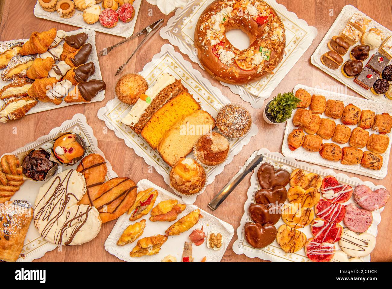 Set of plates with desserts, chocolate palm trees, sweet and savory