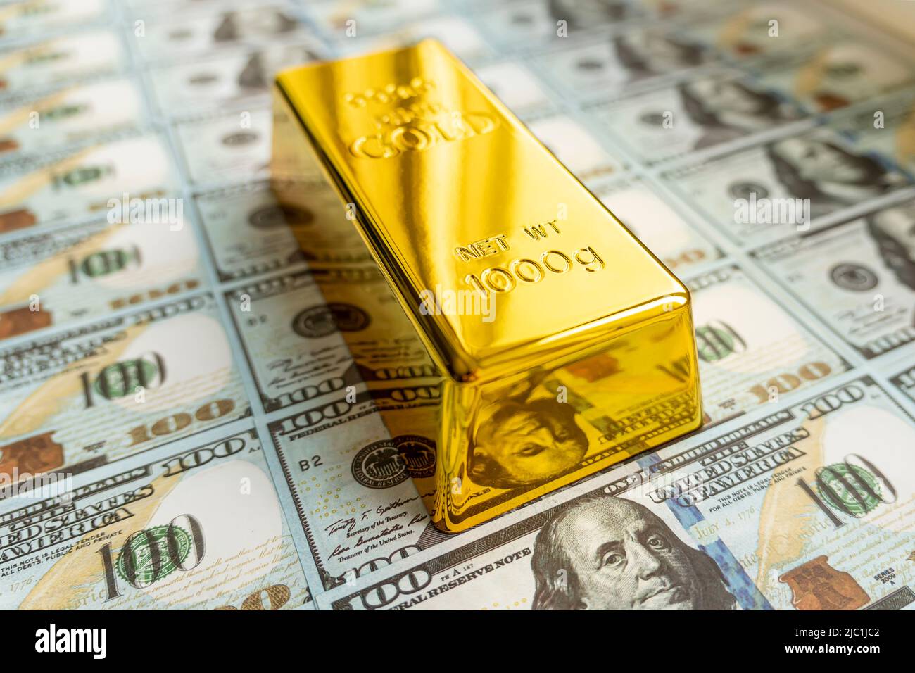 gold bar overlay money dollars, Concept In a poor economy. Investors