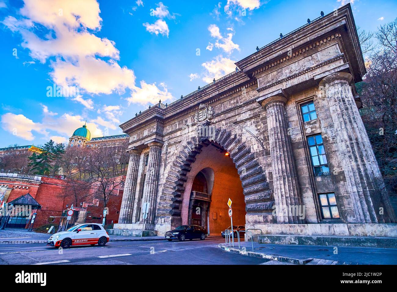 BUDAPEST, HUNGARY - FEBRUARY 23, 2022: The cars drive through the Tunnel, under the Castle Hill in Buda, on February 23 in Budapest, Hungary Stock Photo