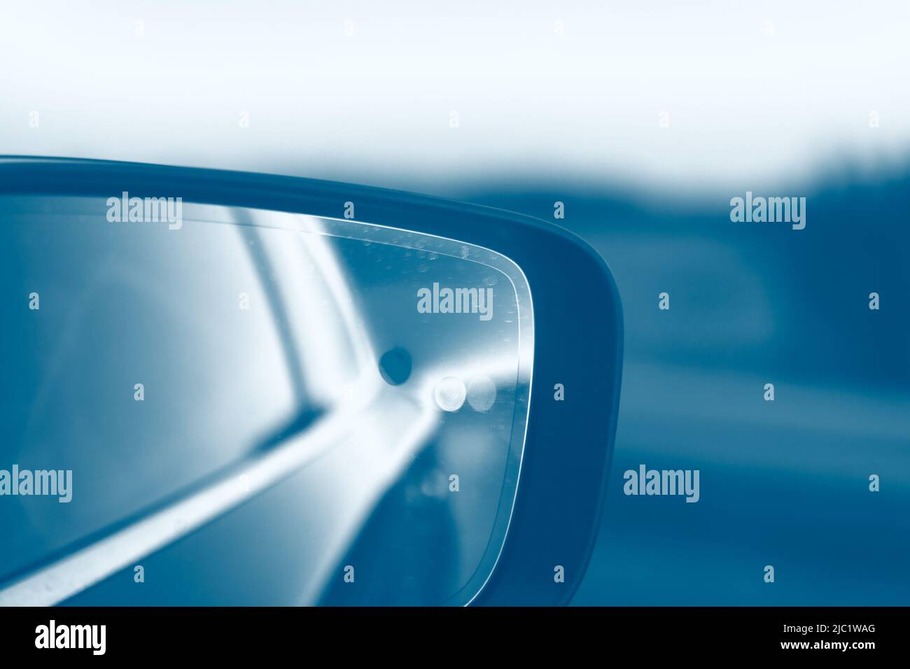 Outside Rearview Mirror . Rear mirror view in driving car Stock Photo