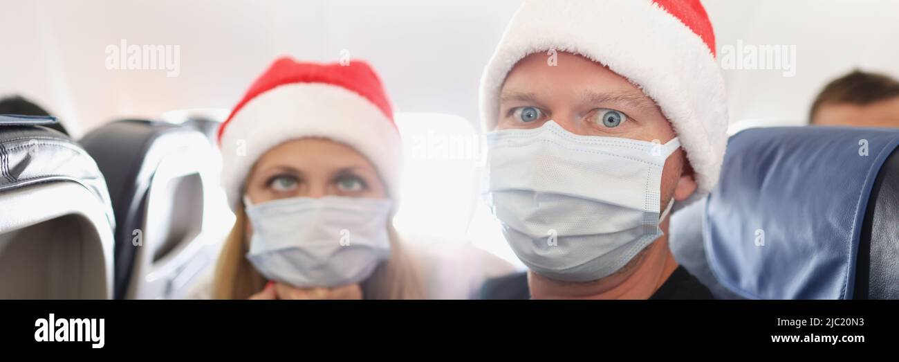 Couple tired of strong restrictions and need to wear face mask on board