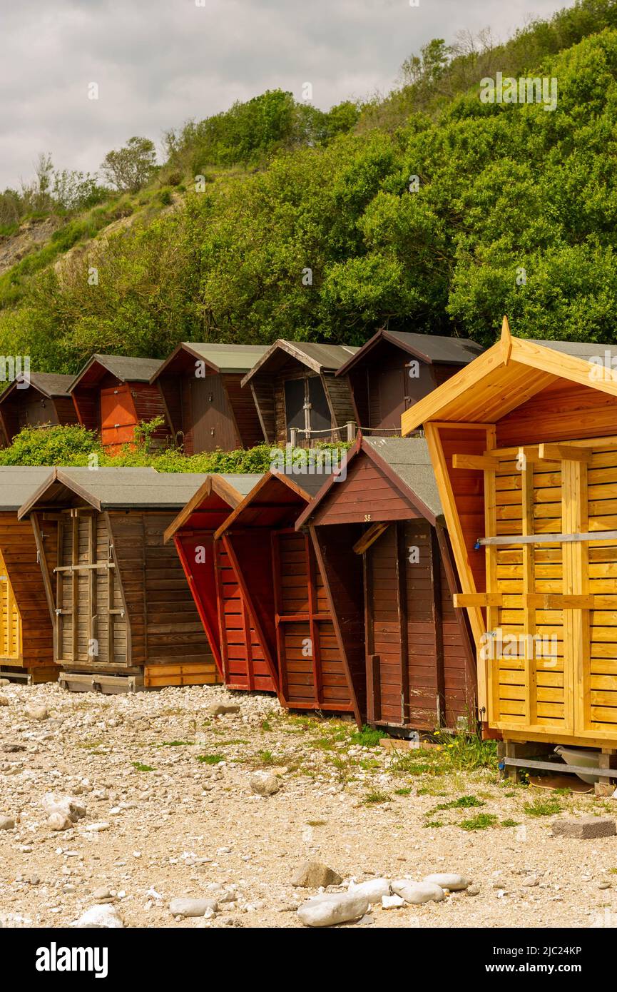Beach Huts on the seafront at Lyme Regis, Dorset, England Stock Photo