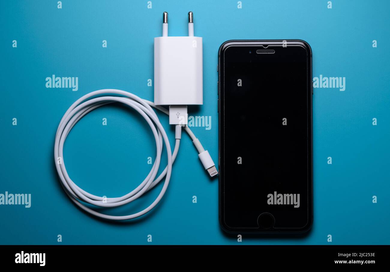 Apple iPhone lightning charger and cable for charging Stock Photo Alamy