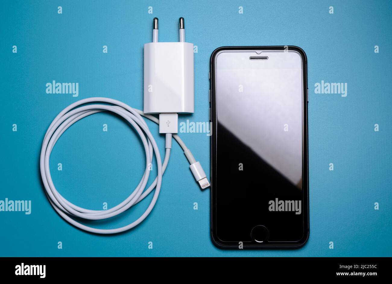 Apple iPhone lightning charger and cable for charging Stock Photo Alamy