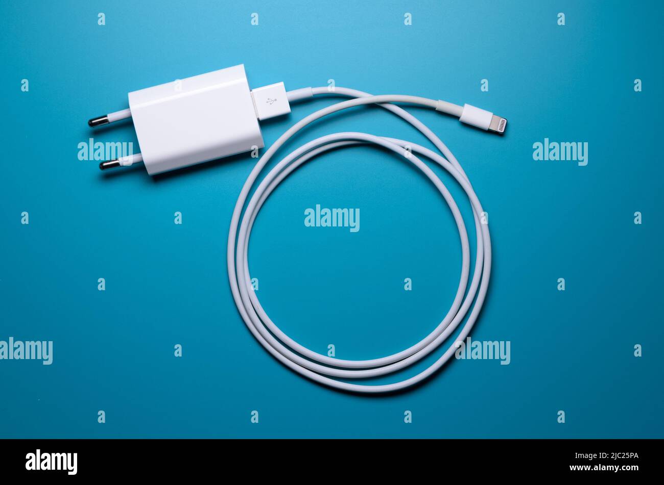 Apple iPhone lightning charger and cable for charging Stock Photo Alamy