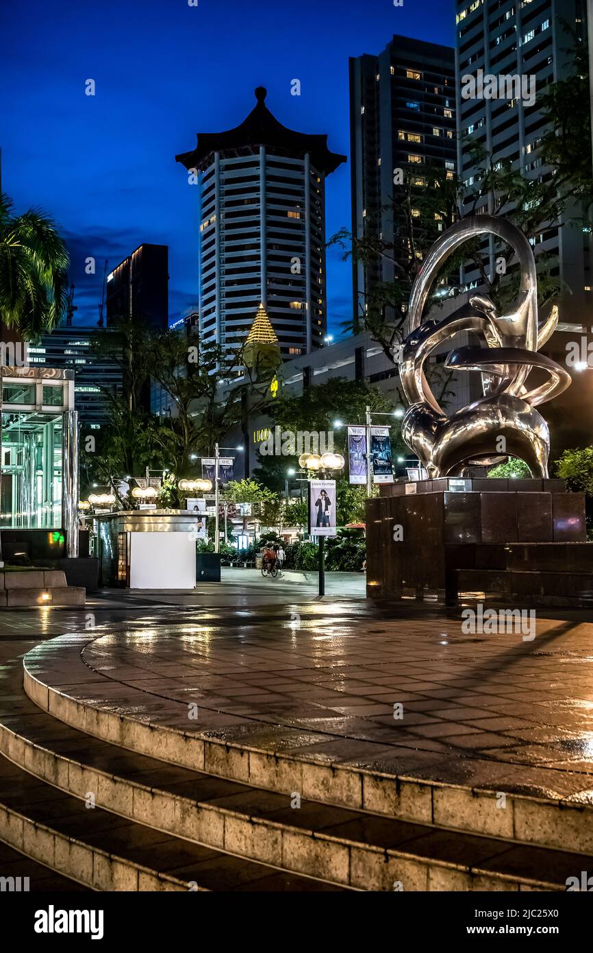 Stage in front of Ngee Ann City at night. It is a shopping and commercial centre located on Orchard Road, Singapore. Stock Photo