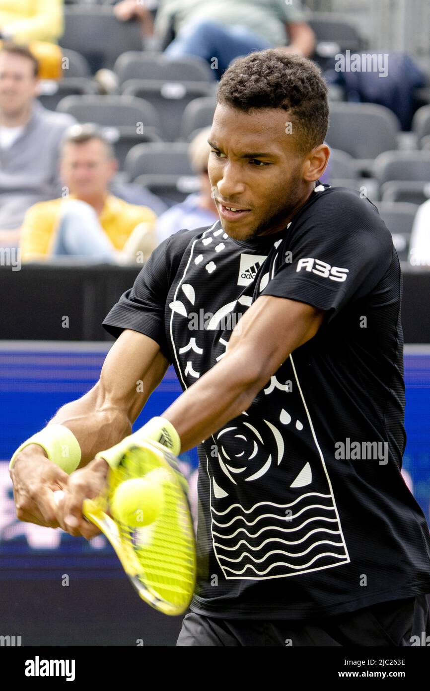 2022-06-09 14:48:20 ROSMALEN - Tennis player Felix Auger-Aliassime (Canada)  in action against Tallon groenpoor (not in photo) at the international  tennis tournament Libema Open. The combined Dutch tennis tournament for men  and