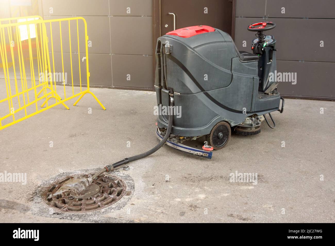 Floor care and cleaning services with professional washing machine the outside of the building