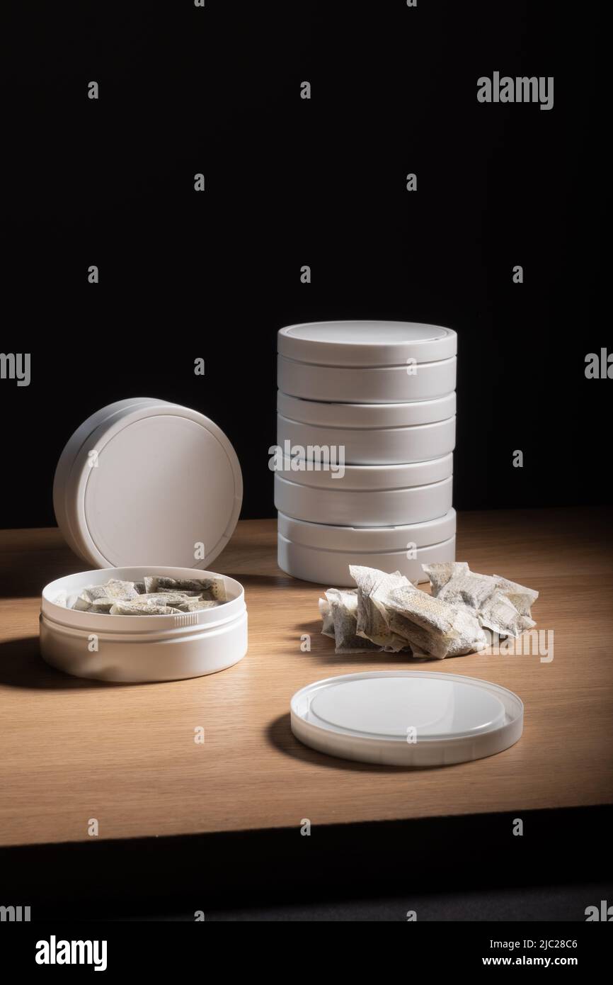 Closeup Of A Metallic Swedish Snus Can With White Portion Snus Pouches A  Blue Loose Snus Portioner In The Foreground Stock Photo - Download Image  Now - iStock