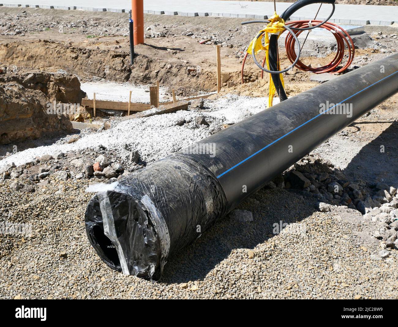 Large plastic pipe at the road construction site Stock Photo Alamy